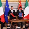Lãnh đạo Trung Quốc và Italy chứng kiến lễ ký Bản ghi nhớ (MoU) về việc Italy tham gia sáng kiến ‘Vành đai và con đường.’ (Nguồn: AFP)