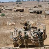 Binh sỹ Israel tham gia huấn luyện trên vùng đất chiếm đóng của Cao nguyên Golan tháng 8/2018. (Nguồn: THX/TTXVN)
