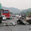 Hiện trường vụ tai nạn nghiêm trọng tại Km20+900, đường Hòa Lạc-Hòa Bình. (Ảnh: Thanh Hải/TTXVN)