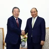 Thủ tướng Nguyễn Xuân Phúc tiếp ông Han Chang-woo, Chủ tịch Tập đoàn Maruhan (Nhật Bản). (Ảnh: Thống Nhất/TTXVN)