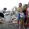 Trẻ em tị nạn Iraq tại khu vực Sadr City, ngoại ô Baghdad. (Ảnh: AFP/TTXVN)