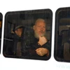 Nhà sáng lập WikiLeaks Julian Assange trong xe cảnh sát. (Nguồn: Reuters)