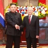 Tổng Bí thư, Chủ tịch nước Nguyễn Phú Trọng đón Chủ tịch Triều Tiên Kim Jong-un khi Chủ tịch Triều Tiên có chuyến thăm hữu nghị chính thức Việt Nam tháng 3/2019. (Ảnh: Doãn Tấn/TTXVN)