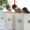 Cử tri bỏ phiếu tại điểm bầu cử ở Jakarta, Indonesia ngày 17/4/2019. (Ảnh: THX/TTXVN)