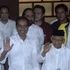 Tổng thống Indonesia Joko Widodo (trái) và người liên danh tranh cử chức phó tổng thống, giáo sỹ Maruf Amin (phải) tại cuộc họp báo sau kết quả kiểm phiếu nhanh ở Jakarta, Indonesia ngày 17/4. (Ảnh: THX/TTXVN)