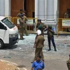 Lực lượng an ninh làm nhiệm vụ tại hiện trường vụ nổ ở nhà thờ thuộc khu vực Kochchikade, Colombo, Sri Lanka, ngày 21/4/2019. (Ảnh: AFP/TTXVN)