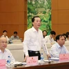 Bộ trưởng Bộ Xây dựng Phạm Hồng Hà giải trình tại phiên họp. (Ảnh: Văn Điệp/TTXVN)