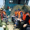 Lực lượng Cảnh sát biển Việt Nam và Trung Quốc kiểm tra tàu cá TH 92016 TS của ngư dân Việt Nam trên Vịnh Bắc Bộ. (Ảnh: An Đăng/TTXVN)