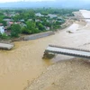 Cầu Ngòi Thia tại huyện Trạm Tấu, Yên Bái bị lũ cuốn trôi ngày 11/10/2017. (Ảnh: Tuấn Anh/Vietnam+)