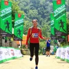 Vận động viên Lê Thị Lan (Thanh Hóa) giành chiến thắng ở cự ly 10km nữ. (Ảnh: Hoa Mai/TTXVN)