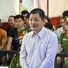 Bị cáo Lê Quốc Bình tại phiên tòa xét xử sơ thẩm. (Ảnh: Nguyên Linh/TTXVN)