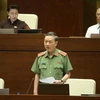 Đại tướng, Bộ trưởng Bộ Công an Tô Lâm trả lời chất vấn của các đại biểu Quốc hội. (Ảnh: Doãn Tấn/TTXVN)