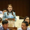 Đại biểu Quốc hội tỉnh Thanh Hóa Bùi Thị Thủy đặt câu hỏi chất vấn. (Ảnh: Dương Giang/TTXVN)