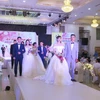 Lễ cưới tập thể của 19 cặp đôi công nhân lao động trên địa bàn tỉnh Thái Nguyên. (Ảnh: Quân Trang/TTXVN)