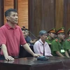 Bị cáo Nguyen Michael Phuong Minh tại phiên tòa. (Ảnh: TTXVN)