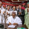 Tổng thống Nigeria Muhammadu Buhari ký AfCFTA ở Niamey, Niger. (Nguồn: Phủ Tổng thống Nigeria)
