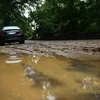 Cảnh ngập lụt sau trận mưa lớn ở Washington, DC, Mỹ ngày 8/7. (Ảnh: AFP/TTXVN)