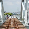 Cầu đường sắt Bình Lợi mới. (Ảnh: Tiến Lực/TTXVN)