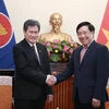 Phó Thủ tướng, Bộ trưởng Ngoại giao Phạm Bình Minh tiếp Tổng Thư ký ASEAN Lim Jock Hoi. (Ảnh: Lâm Khánh/TTXVN)
