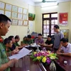 Cơ quan an ninh điều tra-Công an tỉnh Hà Giang đọc lệnh bắt tạm giam đối với Vũ Trọng Lương. (Ảnh: Diệu Loan/TTXVN)