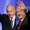 Thủ tướng sắp mãn nhiệm của Israel Benjamin Netanyahu (trái) ngày 19/9 kêu gọi đối thủ chính của mình là Benny Gantz (phải) thuộc đảng trung dung Xanh-Trắng chung tay lập liên minh đoàn kết. (Ảnh: AFP/TTXVN)