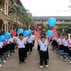 Học sinh Trường Song ngữ Lào-Việt Nguyễn Du trong ngày khai giảng. (Ảnh minh họa: Phạm Kiên/TTXVN)