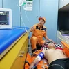 Tàu cứu hộ cứu nạn đưa bệnh nhân về đất liền để tiếp tục theo dõi tại Viện Y học biển Việt Nam. (Ảnh: TTXVN)