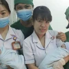 Hai bé sinh đôi ra đời khỏe mạnh và đang được tiếp tục theo dõi, điều trị tại bệnh viện. (Ảnh: Lê Xuân/TTXVN)
