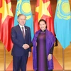 Chủ tịch Quốc hội Nguyễn Thị Kim Ngân và Chủ tịch Hạ viện Kazakhstan Nurlan Nigmatulin tại Lễ đón. (Ảnh: Trọng Đức/TTXVN)