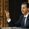 Tổng thống Syria Bashar al-Assad phát biểu trong một cuộc họp tại Damascus. (Ảnh: AFP/TTXVN)