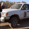 Chiếc xe của Liên hợp quốc bị ném lựu đạn. (Nguồn: AP)