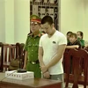 Bị cáo Lâm Trung Kiên nghe tuyên án. (Ảnh: Thanh Tân/TTXVN)