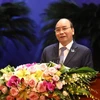 Thủ tướng Nguyễn Xuân Phúc phát biểu kết luận buổi đối thoại. (Ảnh: Văn Điệp/TTXVN)