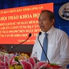 Ủy viên Bộ Chính trị, Phó Thủ tướng Thường trực Chính phủ Trương Hòa Bình, phát biểu tại Hội thảo. (Ảnh: Thanh Bình/TTXVN)