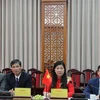 Đoàn cán bộ, lãnh đạo Ủy ban Mặt trận Tổ quốc Việt Nam thành phố Hà Nội tại buổi hội đàm. (Ảnh: Nguyễn Thắng/TTXVN)