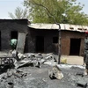Cảnh sát gác tại hiện trường một vụ tấn công tại Gubio, bang Borno, Đông Bắc Nigeria. (Ảnh: AFP/TTXVN)
