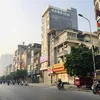 Công trình cao 7 tầng và 1 tum tại 174-176 Nguyễn Xiển (phường Hạ Đình, quận Thanh Xuân, Hà Nội) phát hiện xây sai phép tầng tum từ năm 2014 nhưng giữa năm 2019 mới xử lý xong vi phạm. (Ảnh: Minh Nghĩa/TTXVN)