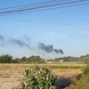 Cháy tuabin trên trụ điện gió tại Nhà máy Phong điện Bình Thạnh. (Ảnh: Nguyễn Thanh/TTXVN)