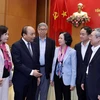 Thủ tướng Nguyễn Xuân Phúc và Trưởng Ban Dân vận Trung ương Trương Thị Mai với các đại biểu dự hội nghị. (Ảnh: Thống Nhất/TTXVN)