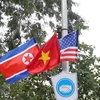 Cờ Mỹ, cờ Triều Tiên và cờ Việt Nam được treo trên các tuyến phố xung quanh hồ Hoàn Kiếm trong dịp diễn ra Hội nghị thượng đỉnh Mỹ-Triều Tiên tại Hà Nội. (Ảnh: Danh Lam/TTXVN)