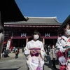 Người dân đeo khẩu trang để phòng tránh lây nhiễm COVID-19 tại Tokyo, Nhật Bản, ngày 3/2/2020. (Ảnh: AFP/TTXVN)