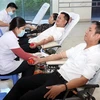 Đoàn viên thanh niên các đơn vị hiến máu tình nguyện tại ngày hội. (Ảnh: Trần Lê Lâm/TTXVN)