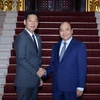 Thủ tướng Nguyễn Xuân Phúc tiếp ông Iwamura Yasutsugu, Tổng Giám đốc Công ty TNHH Aeon Mall Việt Nam (thuộc Tập đoàn Aeon, Nhật Bản). (Ảnh: Thống Nhất/TTXVN)