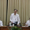 Ông Lê Thanh Liêm, Phó Chủ tịch Thường trực UBND Thành phố Hồ Chí Minh, phát biểu tại buổi làm việc. (Ảnh: Hứa Chung/TTXVN)