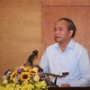 Chủ tịch UBND tỉnh Vĩnh Phúc Nguyễn Văn Trì phát biểu tại hội nghị. (Ảnh: Hoàng Hùng/TTXVN)