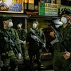 Cảnh sát Philippines tại một chốt chặn ở thủ đô Manila ngày 15/3/2020. (Ảnh: THX/TTXVN)