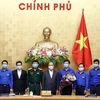Thủ tướng Nguyễn Xuân Phúc với các thành viên Ban Bí thư Trung ương Đoàn TNCS Hồ Chí Minh. (Ảnh: Thống Nhất/TTXVN)