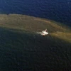 Vệt dầu tràn sau vụ nổ giàn khoan Deepwater Horizon ngoài khơi Louisiana, Mỹ, ngày 7/5/2010. (Ảnh: AFP/TTXVN)