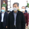 Bị cáo Nguyễn Bắc Son, cựu Bộ trưởng Bộ Thông tin và Truyền thông và các bị cáo nghe Hội đồng xét xử đọc bản tuyên án. (Ảnh: Doãn Tấn/TTXVN)