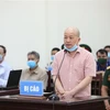Bị cáo Đinh Ngọc Hệ khai báo trước Hội đồng xét xử. (Ảnh: Dương Giang/TTXVN)